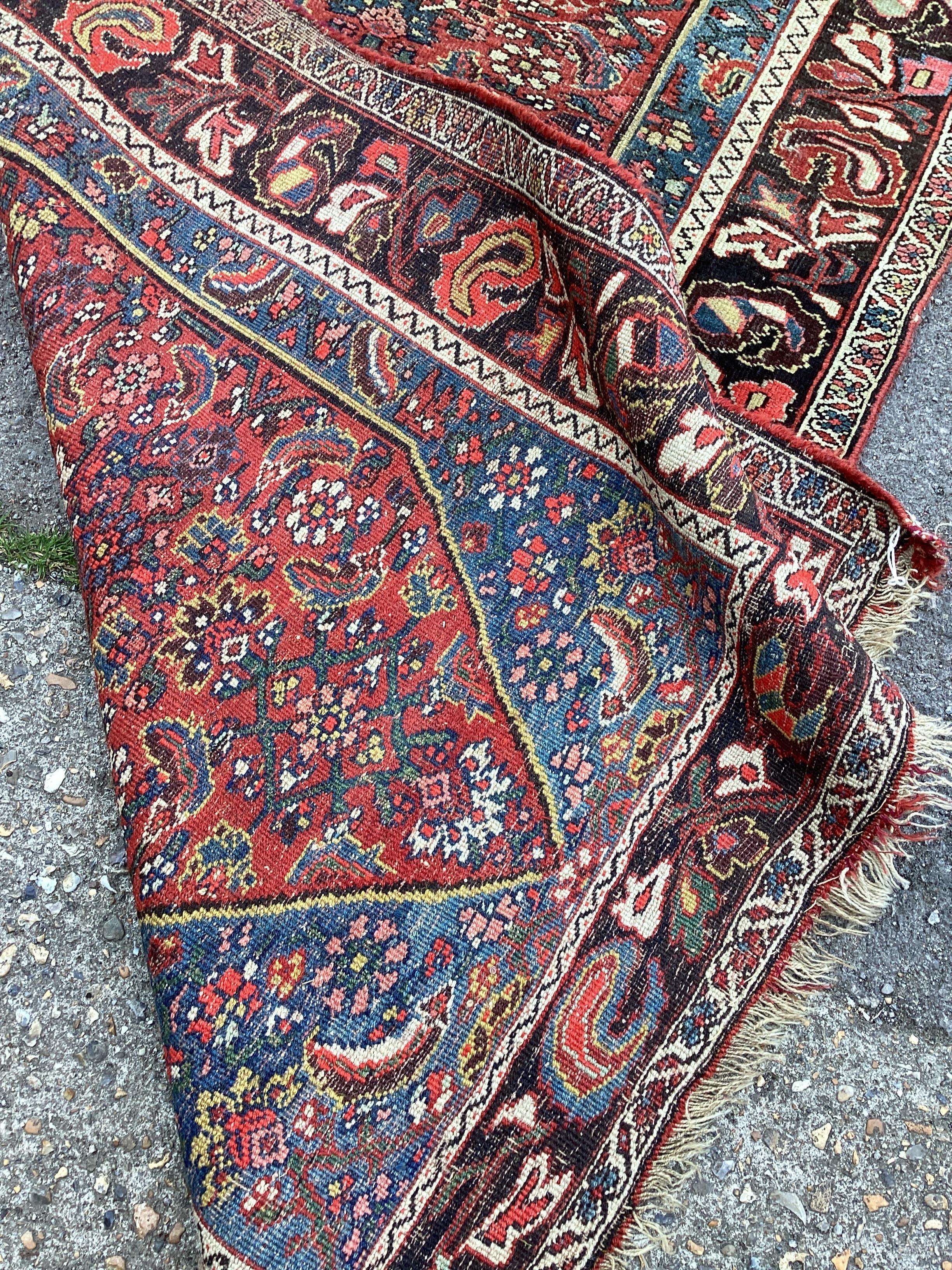 An antique North West Persian Baidjar red ground rug, 191 x 108cm